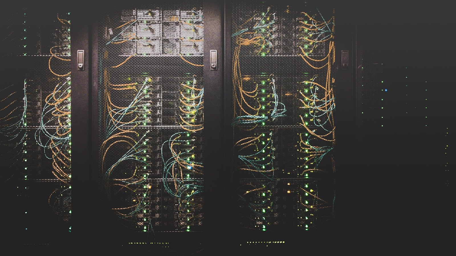 Server bays and network cables in a data centre.